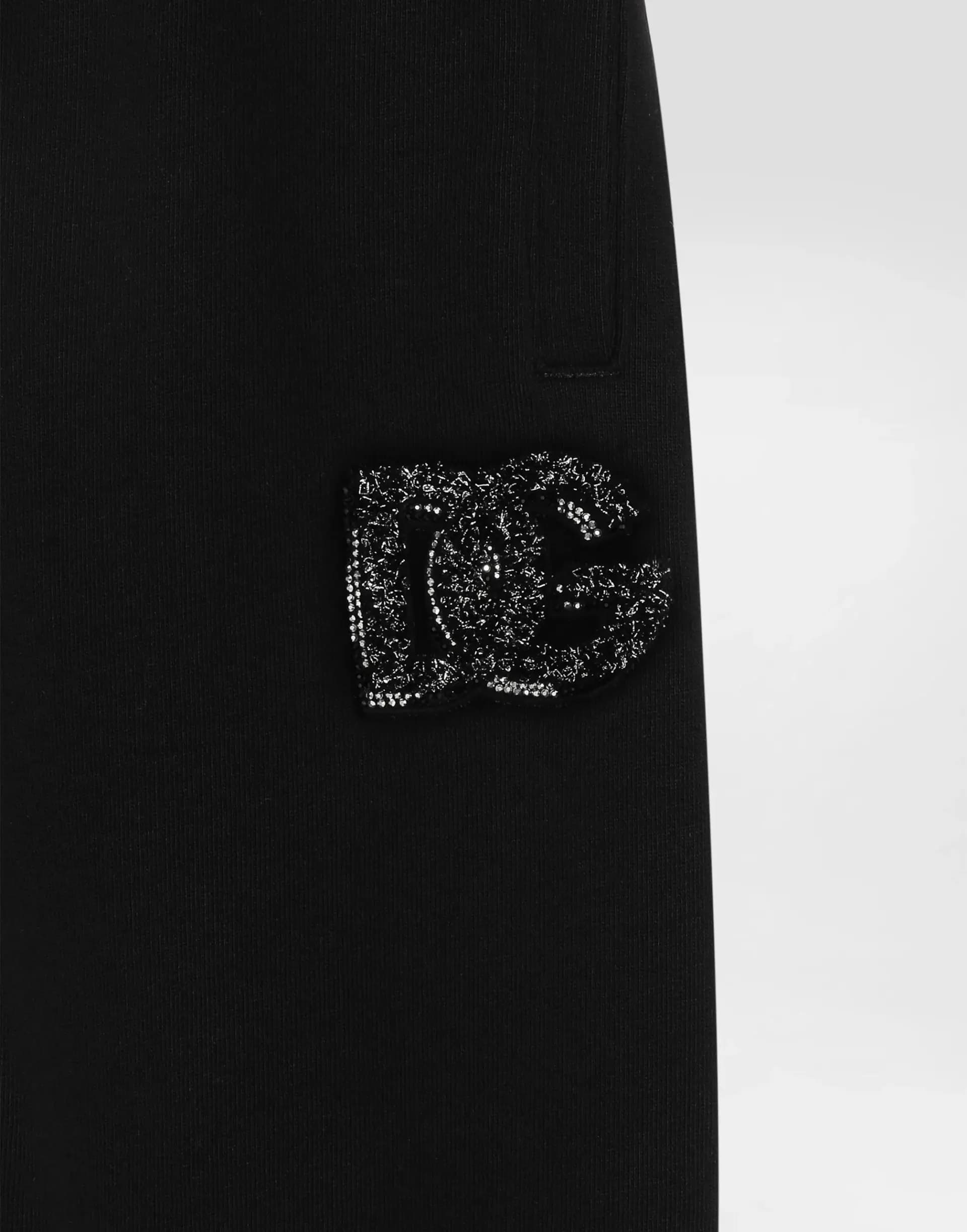 Dolce & Gabbana Kids Дитячі оверсайз спортивні штани з логотипом DG та стразами - 5