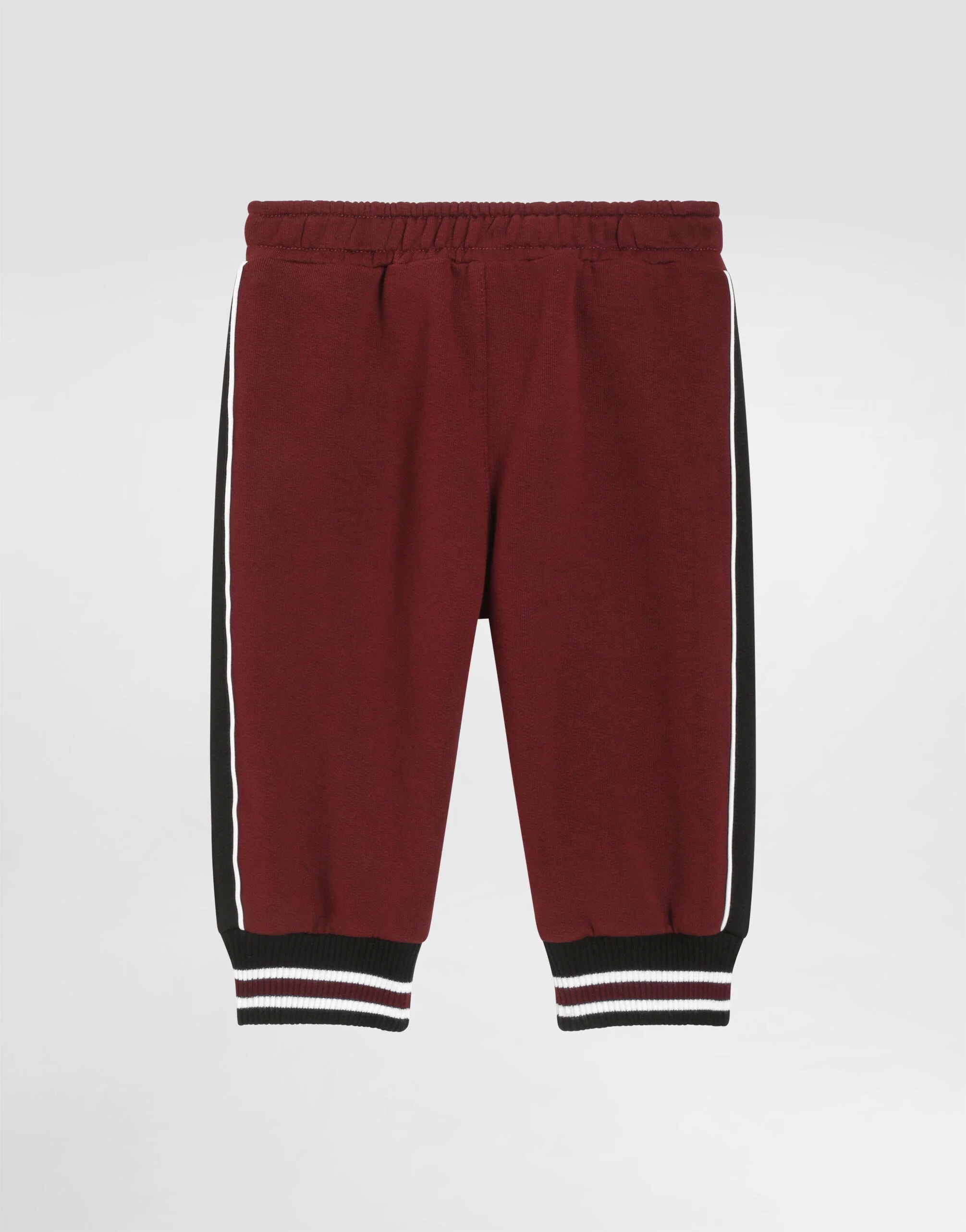 Bawełniane spodnie Dolce & Gabbana Kids z haftowanymi detalami