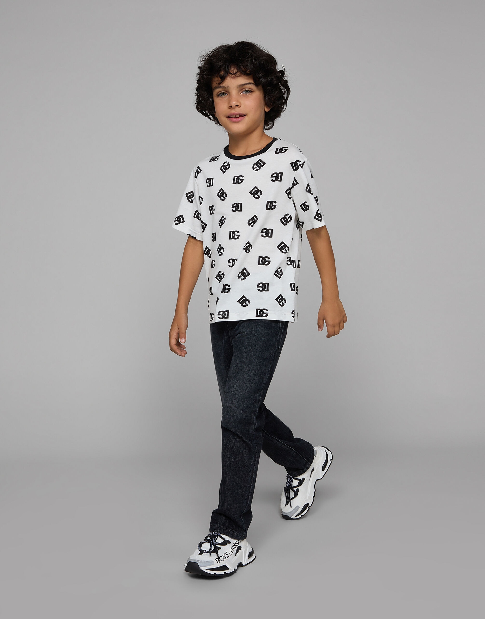 Dolce & Gabbana Kids Дитяча футболка джерсі з принтом логотипу DG по всій поверхні