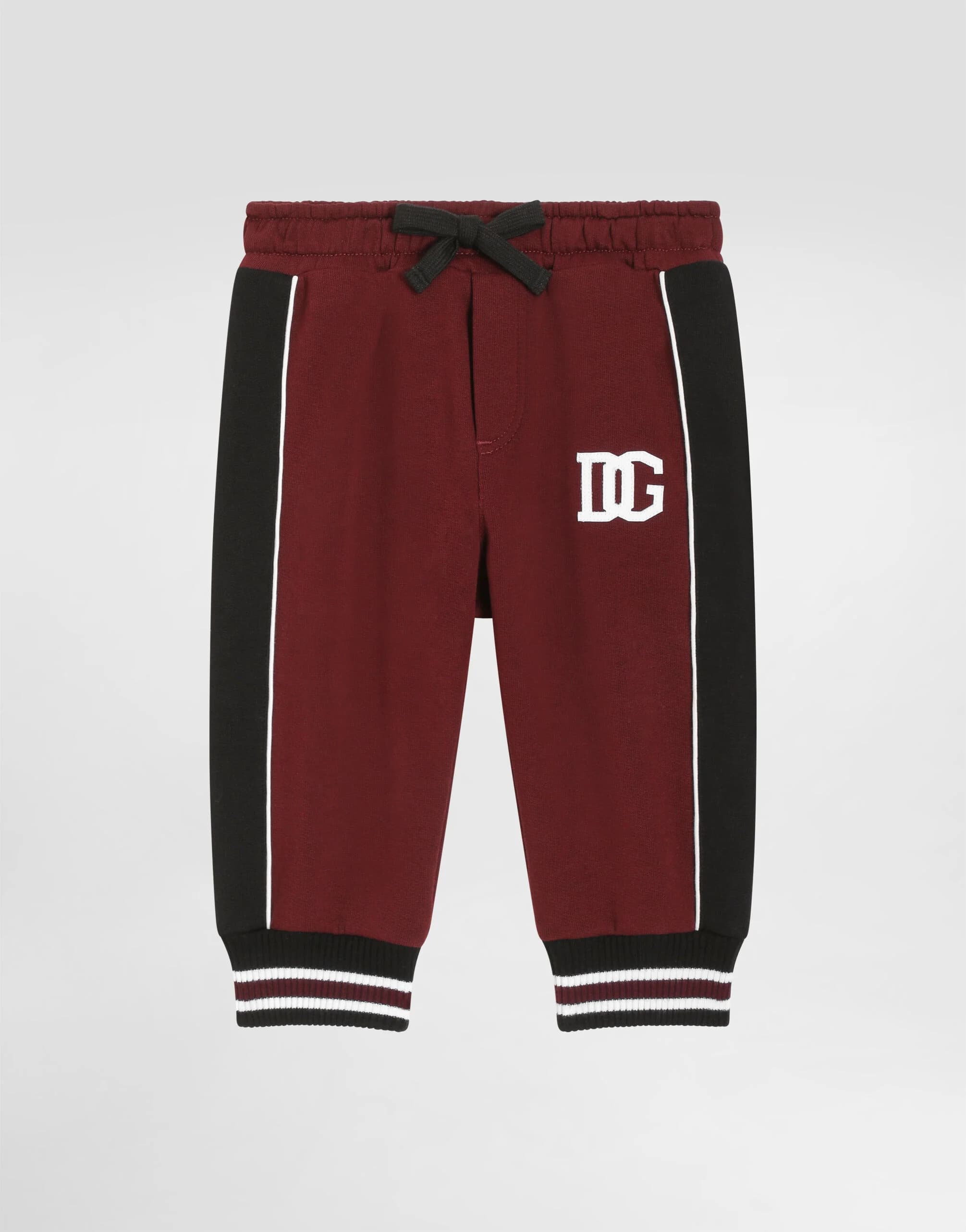 Bawełniane spodnie Dolce & Gabbana Kids z haftowanymi detalami
